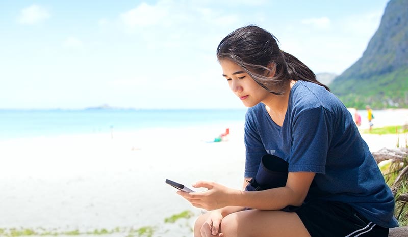 There are many free apps that can give you the local weather. Some even include a local surf report. Jaren Jai Wicklund/Shutterstock.com
