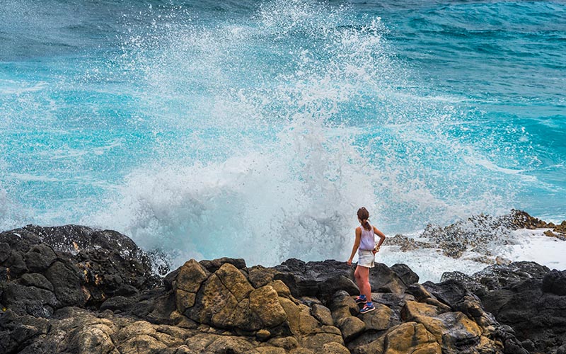 Rogue waves can unexpectedly knock a person into the water and cause serious injury. Phillip B. Espinasse/Shutterstock.com