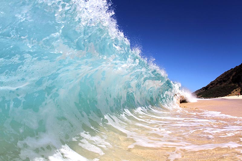Waves that break directly onshore pose a large threat to beachgoers. Mana Photo/Shutterstock.com