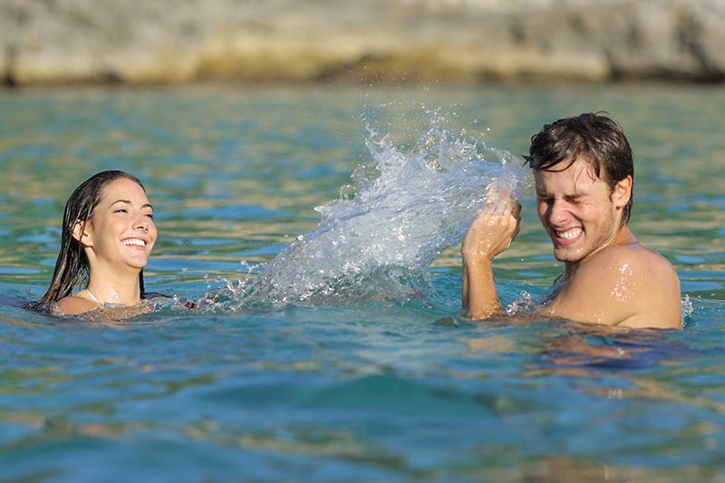 Always swim (or splash around!) with a friend. Antonio Guillem/Shutterstock.com